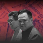 Two men in business attire, grayscale, against a red background patterned with currency notes, walking toward the camera on the left.